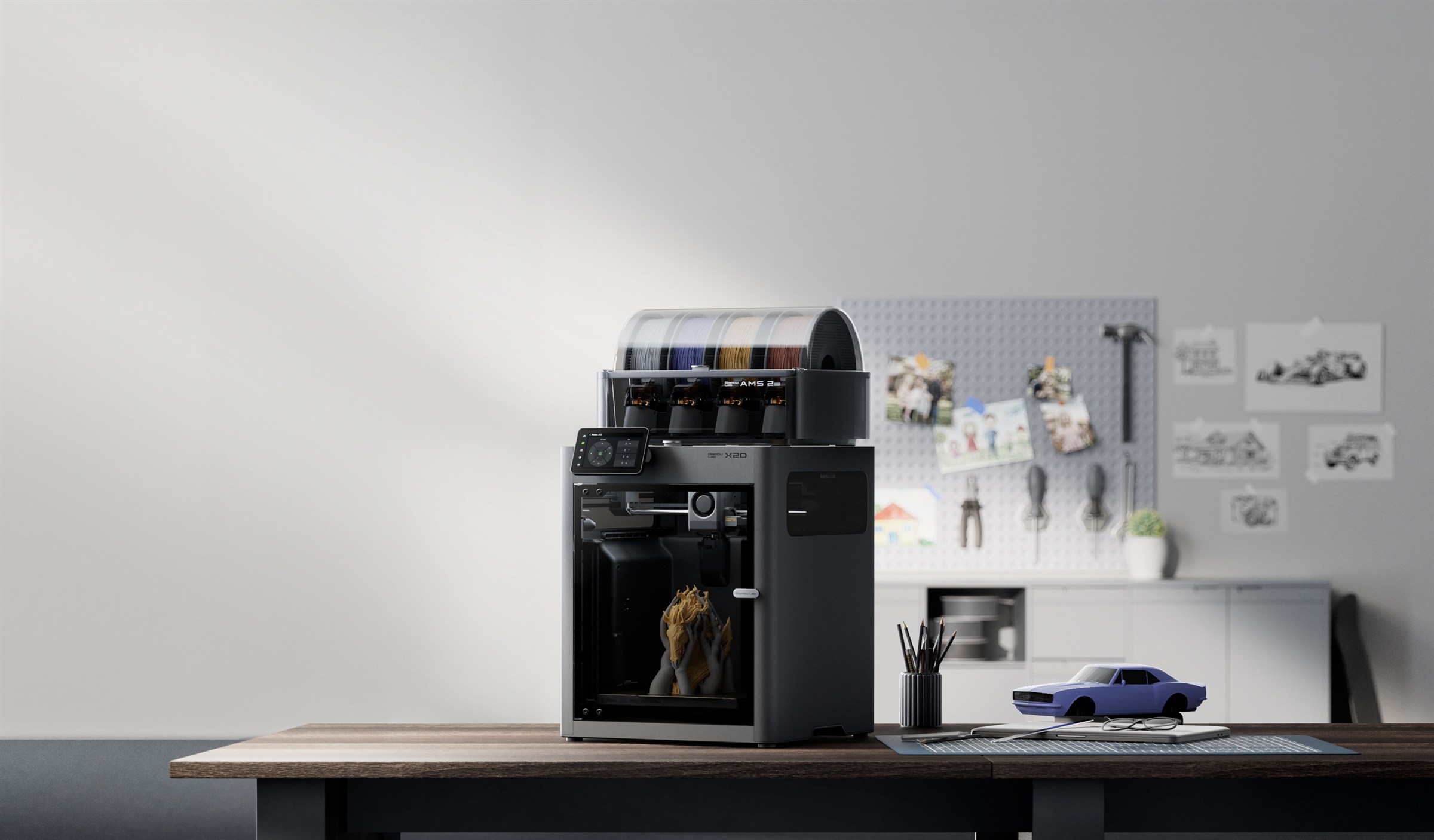 A multi-colour 3D printer mid-print on a workshop bench.
