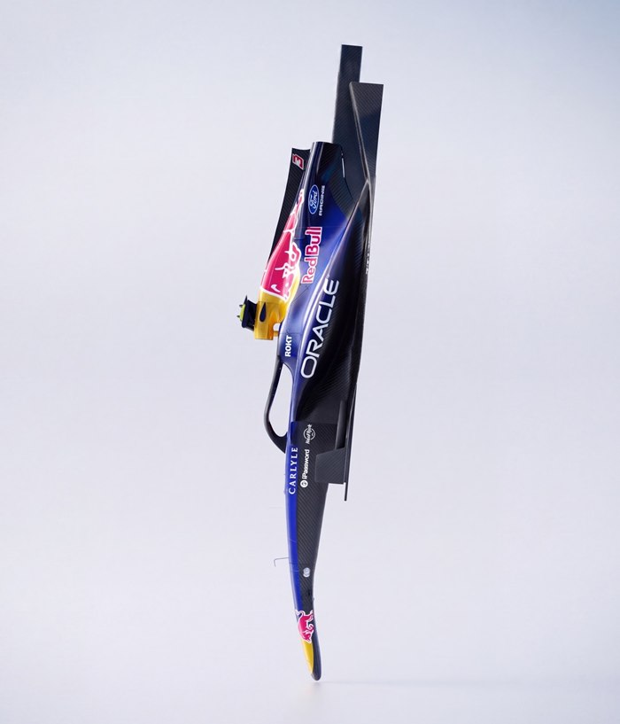 A 3D-printed Red Bull Formula 1 car model seen edge-on.